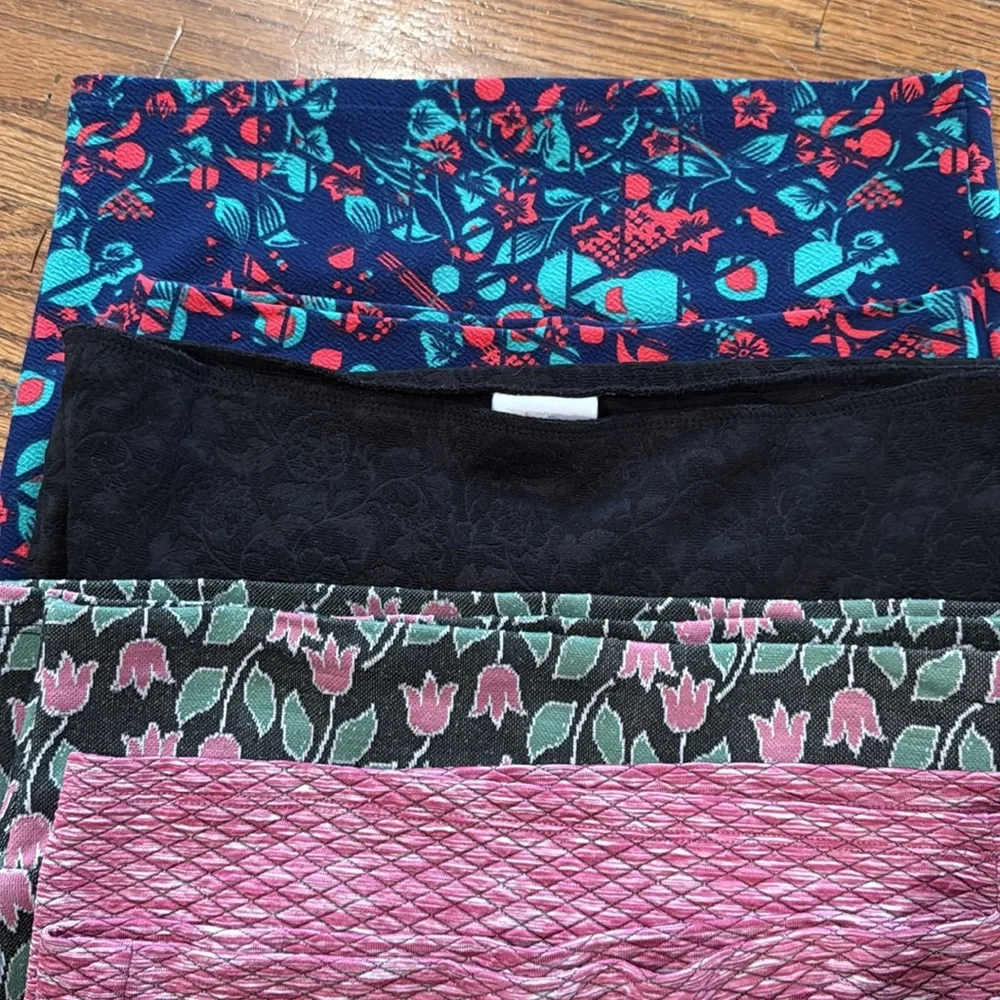 Group of 9 XS and Small LulaRoe skirts in various colors and patterns
